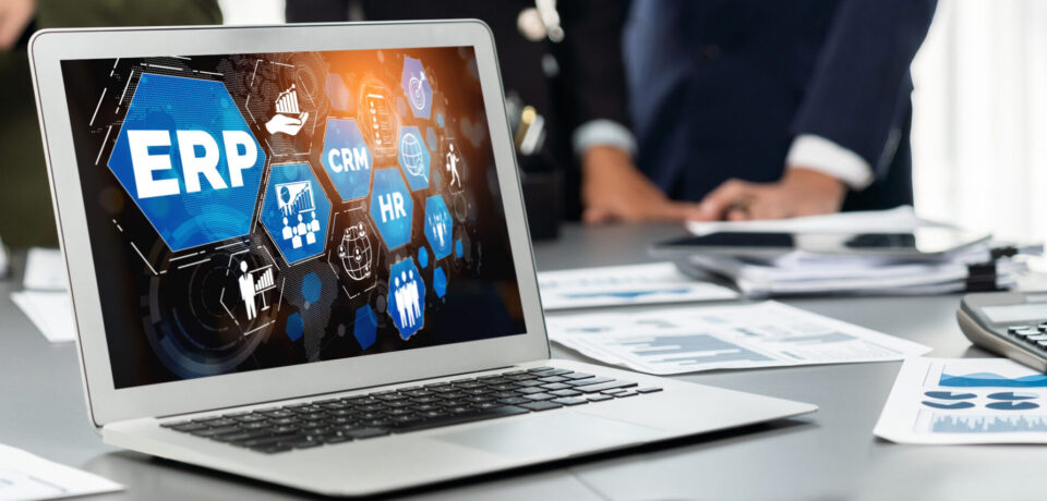 Panorama shot analyst team utilizing BI Fintech to analyze financial report with laptop. Businesspeople analyzing BI data dashboard displayed on laptop screen for business insight. Prodigy